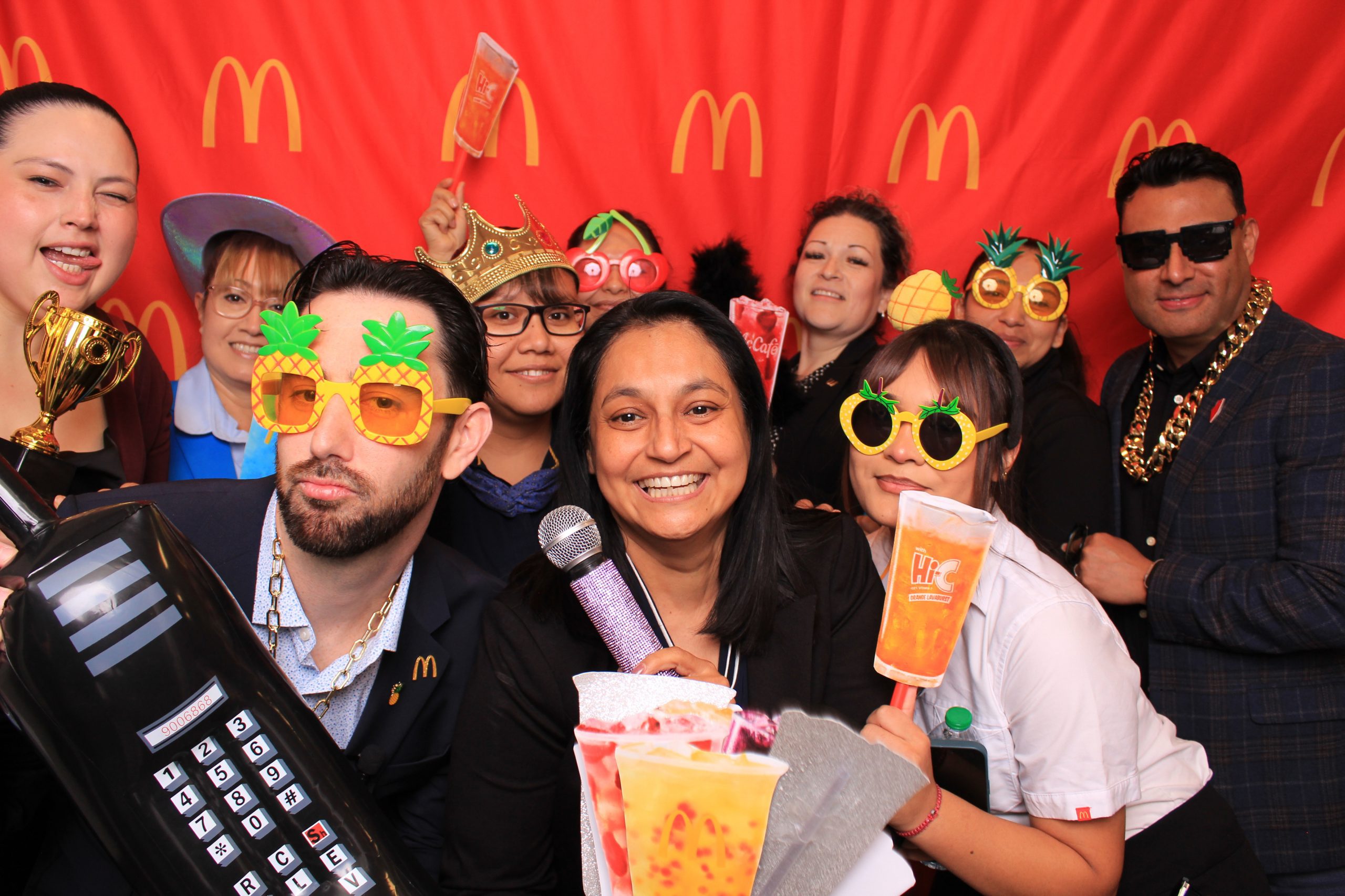 Corporate event photo booth with branded props in Las Vegas